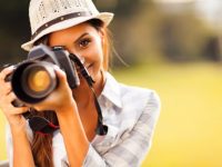 depositphotos_26389223-stock-photo-attractive-young-woman-taking-pictures